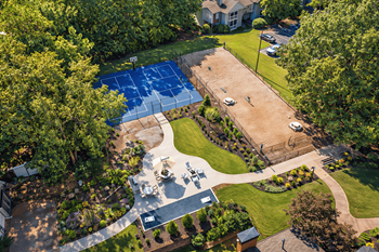 Newly renovated sports court with basketball, pickleball and tennis